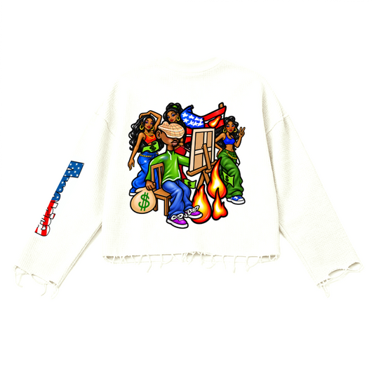 An off-white cropped sweatshirt with distressed frayed edges, featuring a colorful cartoon graphic of a group of friends on the front and a matching graphic on the left sleeve.